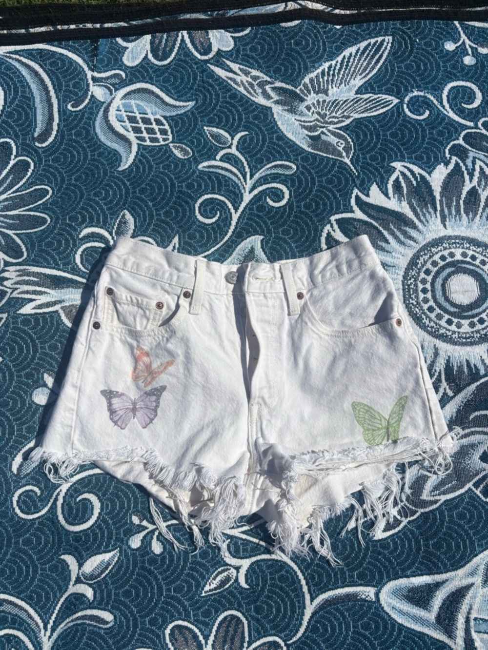 Levi’s 501 white shorts w/ butterflies